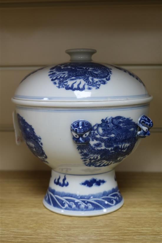 A Chinese blue and white bowl, liner and cover and three vases